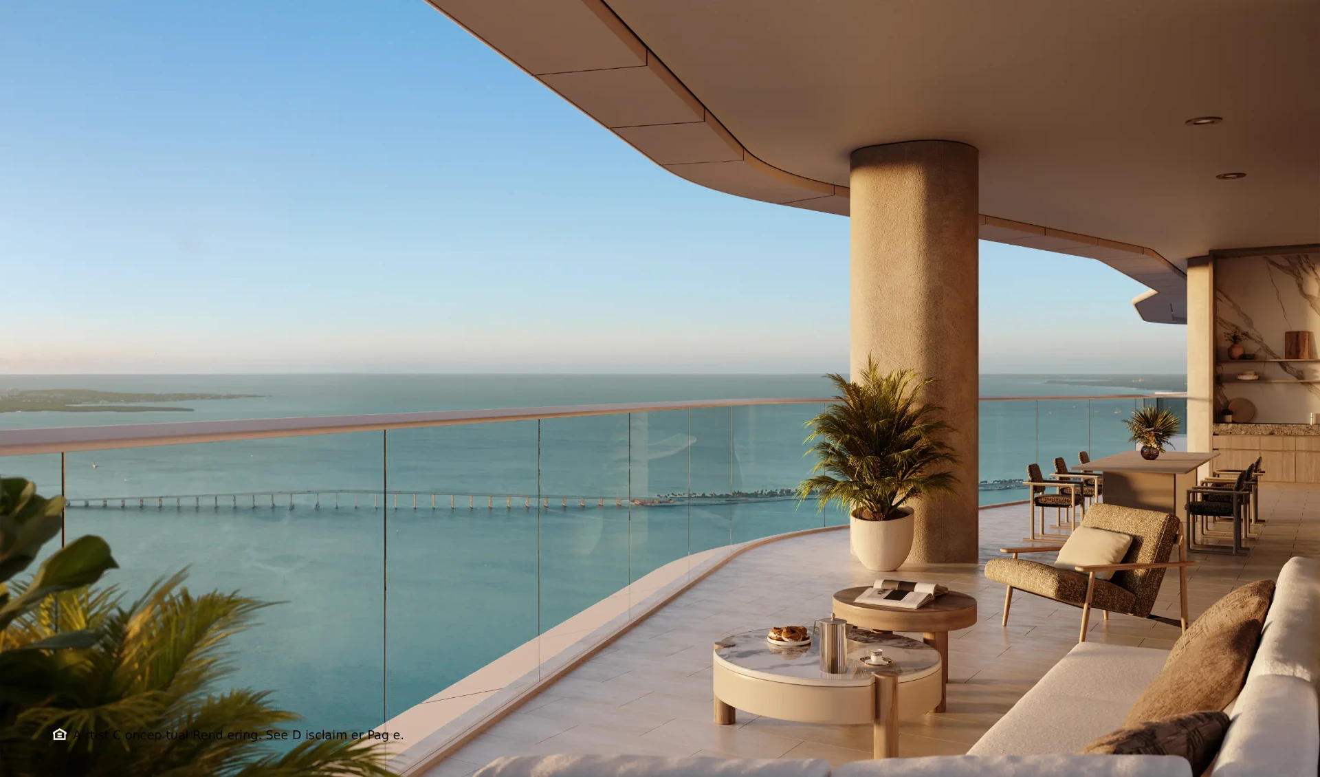 Terraza curva de una residencia de la Torre Sur, con sala exterior y vistas al mar y al puente
