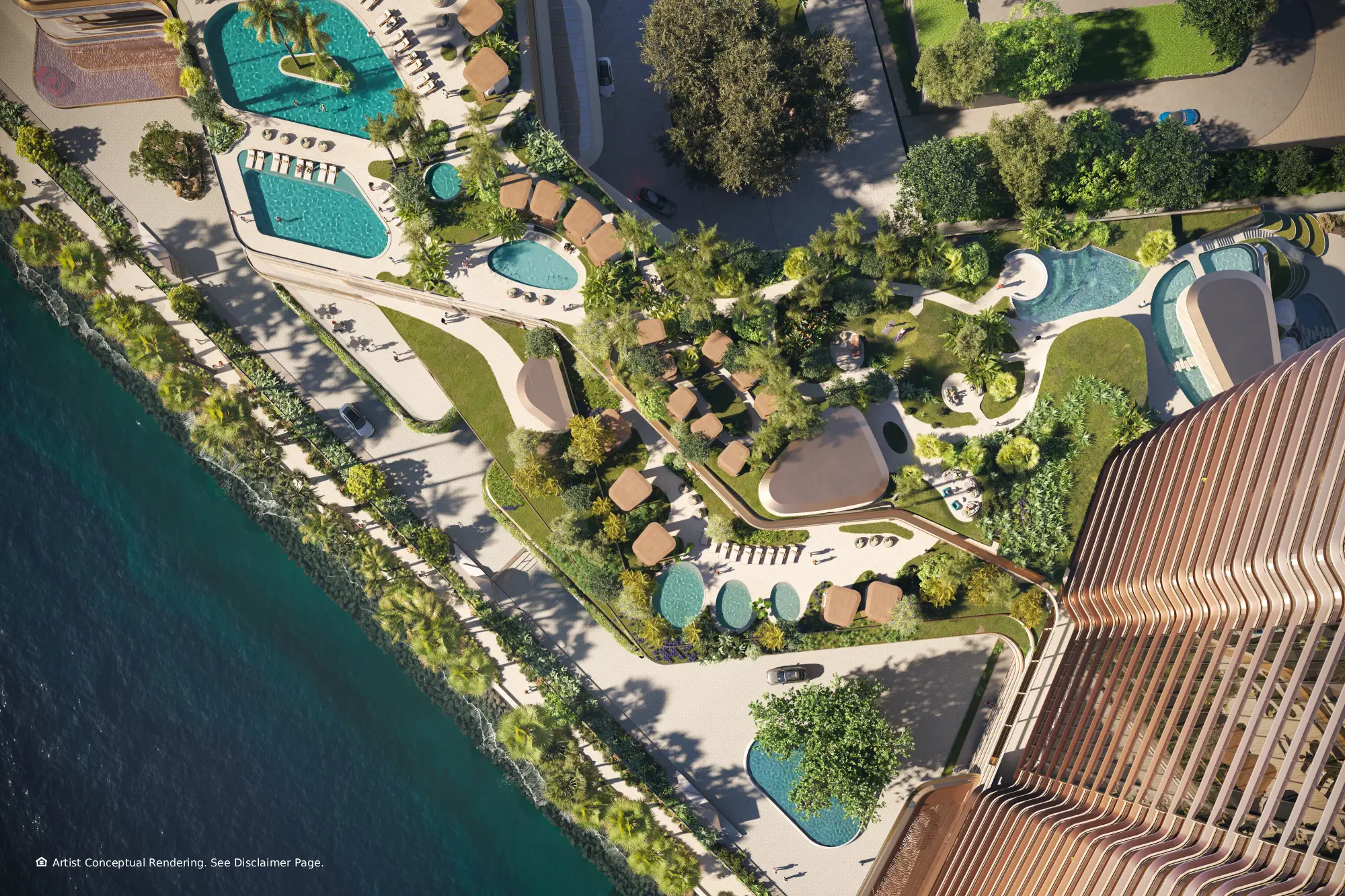 Vista aérea del podio de amenidades de la Torre Sur, con piscinas de formas orgánicas, cabañas y jardines