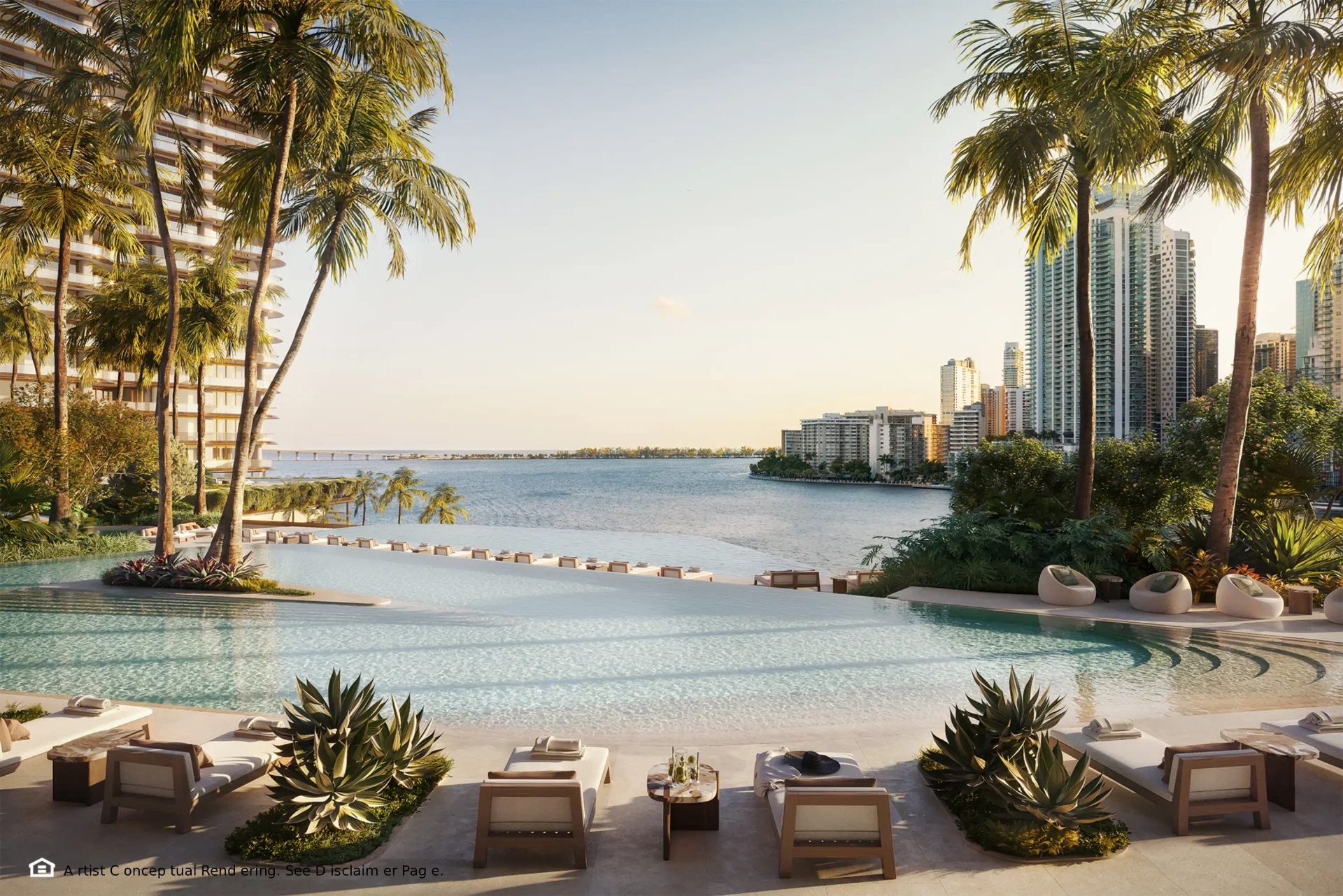 Piscina infinita escalonada de la Torre Sur, con camastros y palmeras frente a Biscayne Bay al atardecer